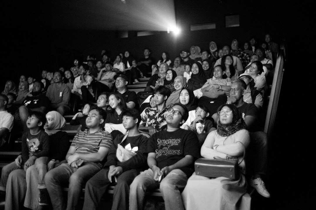 audience listening to speaker