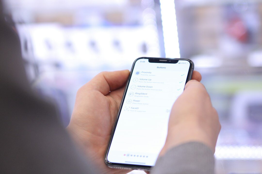 person scrolling on smartphone